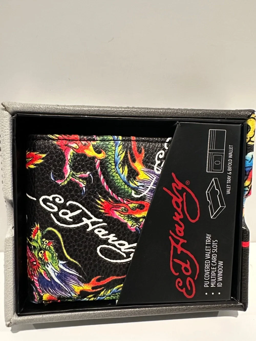 NWT Ed Hardy Men’s Bifold Wallet with Card, ID, Coin and Bill slots.